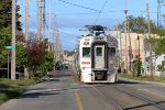 26 brings up the rear as its train pulls down to a stop